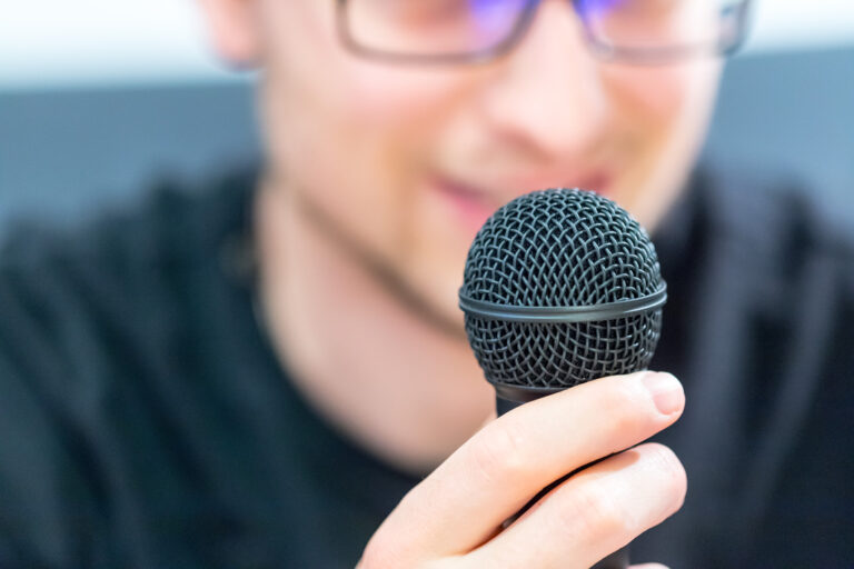 Man talking into microphone